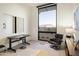 Modern home office with a standing desk and desert views at 8942 E Stagecoach Pass, Carefree, AZ 85377