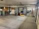 Spacious garage with built-in shelving and ample storage space at 20407 N 107Th Dr, Sun City, AZ 85373