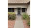 Front entry with security door and walkway at 20407 N 107Th Dr, Sun City, AZ 85373