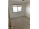 Simple bedroom with carpet and window at 20407 N 107Th Dr, Sun City, AZ 85373