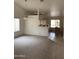 Dining room with view into kitchen at 20407 N 107Th Dr, Sun City, AZ 85373