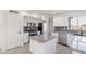 Modern kitchen featuring granite island and updated cabinetry at 1207 N Velero St, Chandler, AZ 85225