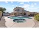 Inviting backyard oasis featuring a sparkling pool and relaxing spa at 1207 N Velero St, Chandler, AZ 85225
