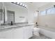 Clean bathroom, featuring bathtub, toilet and granite countertop at 1207 N Velero St, Chandler, AZ 85225