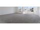 Large bedroom with wall-to-wall carpeting and multiple windows at 1207 N Velero St, Chandler, AZ 85225
