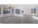 Spacious dining area with gray tile floors and sliding glass doors at 1207 N Velero St, Chandler, AZ 85225