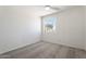 Bright bedroom featuring ceiling fan and large window at 1207 N Velero St, Chandler, AZ 85225
