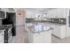 Spacious kitchen with granite countertops and stainless steel appliances at 1207 N Velero St, Chandler, AZ 85225