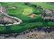 Aerial view of golfers on a scenic golf course at 3219 S Silverberry Ct, Gold Canyon, AZ 85118