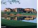 Golf clubhouse with scenic views and water feature at 3219 S Silverberry Ct, Gold Canyon, AZ 85118