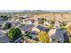 Aerial view of the house, highlighting the backyard, pool, and surrounding neighborhood at 7827 W Donald Dr, Peoria, AZ 85383