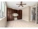 Home office with built-in cabinetry and desk at 16358 W Whitton Ave, Goodyear, AZ 85395