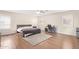 Bedroom with a bed, desk and chair, and plenty of natural light at 5702 W Windrose Dr, Glendale, AZ 85304