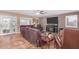 Comfortable living room with fireplace and access to backyard at 5702 W Windrose Dr, Glendale, AZ 85304