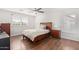 Bedroom with wood floors and a ceiling fan at 5702 W Windrose Dr, Glendale, AZ 85304