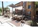 Relaxing pool area with lounge chairs and shaded seating at 4803 N Woodmere Fairway -- # 2006, Scottsdale, AZ 85251