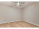 Spacious bedroom with light walls and hardwood floors at 4803 N Woodmere Fairway -- # 2006, Scottsdale, AZ 85251