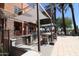 Outdoor kitchen and BBQ area with seating at 4803 N Woodmere Fairway -- # 2006, Scottsdale, AZ 85251