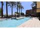 Resort-style pool and spa with palm trees at 4803 N Woodmere Fairway -- # 2006, Scottsdale, AZ 85251