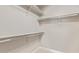 Large walk-in closet with double hanging rods and shelves at 4803 N Woodmere Fairway -- # 2006, Scottsdale, AZ 85251