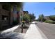 Neat street view of the community with residential buildings and landscaping at 4803 N Woodmere Fairway -- # 2006, Scottsdale, AZ 85251