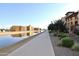 Waterfront path with canal and building views at 4803 N Woodmere Fairway -- # 2006, Scottsdale, AZ 85251