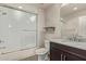 Clean bathroom with shower/tub combo and marble vanity at 4803 N Woodmere Fairway -- # 2006, Scottsdale, AZ 85251