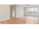 Bright living room with hardwood floors and city view at 4803 N Woodmere Fairway -- # 2006, Scottsdale, AZ 85251