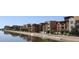 Luxury building with canal side walkway and reflection at 4803 N Woodmere Fairway -- # 2006, Scottsdale, AZ 85251