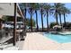 Outdoor kitchen and BBQ area with pool views at 4803 N Woodmere Fairway -- # 2006, Scottsdale, AZ 85251