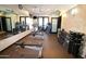 Well-equipped fitness center with weights and machines at 4803 N Woodmere Fairway -- # 2006, Scottsdale, AZ 85251