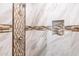 Shower with stylish tile detail and niche at 8753 E Greenview Dr, Gold Canyon, AZ 85118