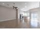 Spacious living room with tile floors and a ceiling fan at 8753 E Greenview Dr, Gold Canyon, AZ 85118