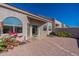 Back exterior of house with a walkway and desert landscaping at 8753 E Greenview Dr, Gold Canyon, AZ 85118