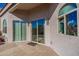 Private patio with sliding glass doors leading to the backyard at 8753 E Greenview Dr, Gold Canyon, AZ 85118