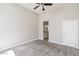 Carpeted bedroom with ceiling fan and en-suite bathroom access at 8753 E Greenview Dr, Gold Canyon, AZ 85118