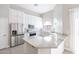 Modern kitchen featuring white cabinets, granite countertops, and stainless steel appliances at 8753 E Greenview Dr, Gold Canyon, AZ 85118