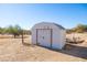 White metal storage shed in the backyard at 30218 N 162Nd Way, Scottsdale, AZ 85262