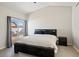 Main bedroom with a king-size bed and access to the pool at 6617 E Northridge St, Mesa, AZ 85215
