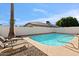 Relaxing pool area with lounge chairs at 6617 E Northridge St, Mesa, AZ 85215