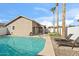 Inviting swimming pool with lounge chairs at 6617 E Northridge St, Mesa, AZ 85215