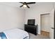 Spacious bedroom with a queen bed and large dresser at 6617 E Northridge St, Mesa, AZ 85215