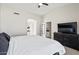 Spacious main bedroom with a king bed and en-suite bathroom at 6617 E Northridge St, Mesa, AZ 85215