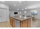 Large kitchen island with double sink and dishwasher at 44395 W Bailey Dr, Maricopa, AZ 85138