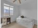 Bright bedroom with a comfortable bed and built-in storage at 44395 W Bailey Dr, Maricopa, AZ 85138