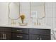 Double vanity bathroom with quartz countertop and gold fixtures at 8728 E Via De Viva --, Scottsdale, AZ 85258