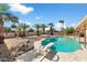 Refreshing pool with diving board and palm trees at 9811 W Royal Oak Rd, Sun City, AZ 85351