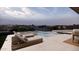 Inviting pool and patio area with lounge chairs at 10948 E Rising Sun Dr, Scottsdale, AZ 85262