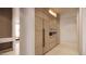 Modern kitchen with wood cabinets and integrated appliances at 10948 E Rising Sun Dr, Scottsdale, AZ 85262