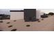 Contemporary home exterior with a private gate at 10948 E Rising Sun Dr, Scottsdale, AZ 85262
